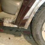 Before and after photographs of a damaged Chevy Impala that was repaired by Elite Paint & Body Shop in West Palm Beach, Florida.
